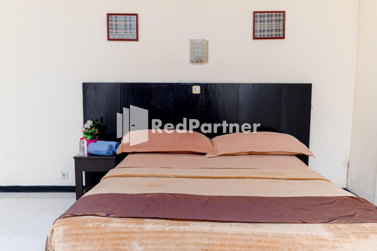Cherry Pink Hotel Medan Mitra Reddoorz Esterno foto