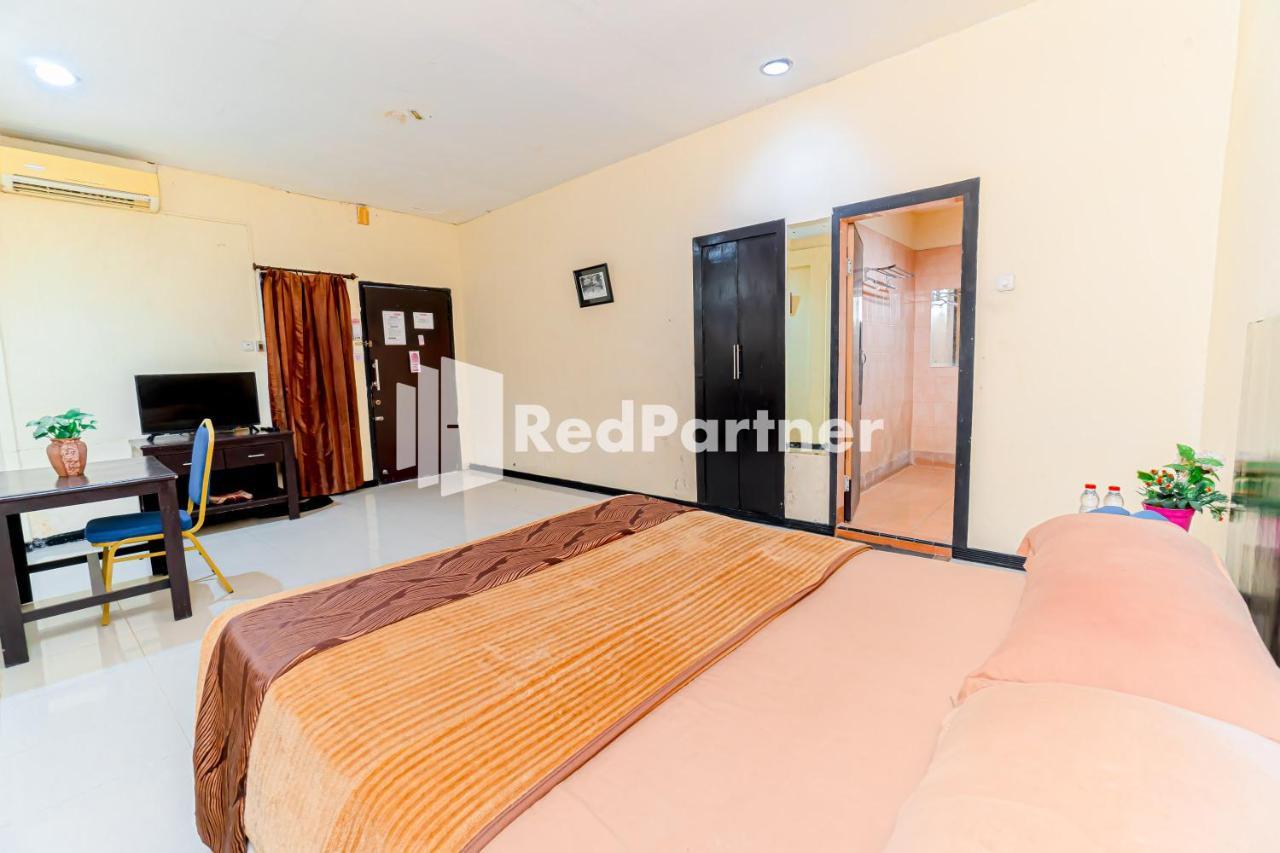Cherry Pink Hotel Medan Mitra Reddoorz Esterno foto